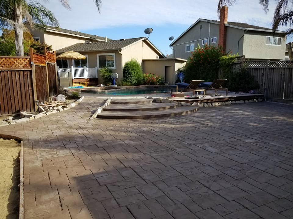 Herringbone stamped pool patio with steps
